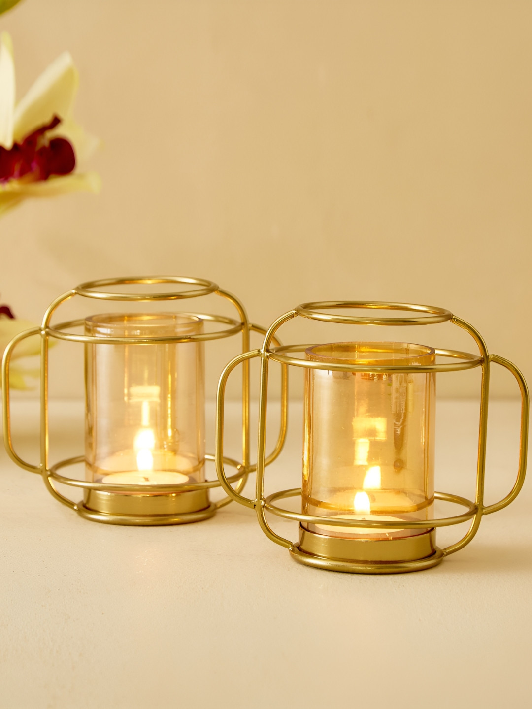 

Home Centre Raga Alora Beige & Transparent 2 Pieces Glass Candle Holder