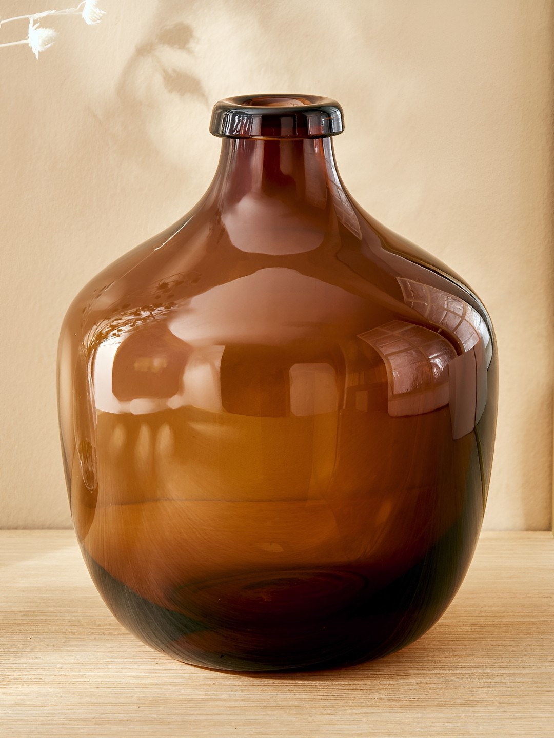 

Home Centre Amida Brown Glass Bottle Vases