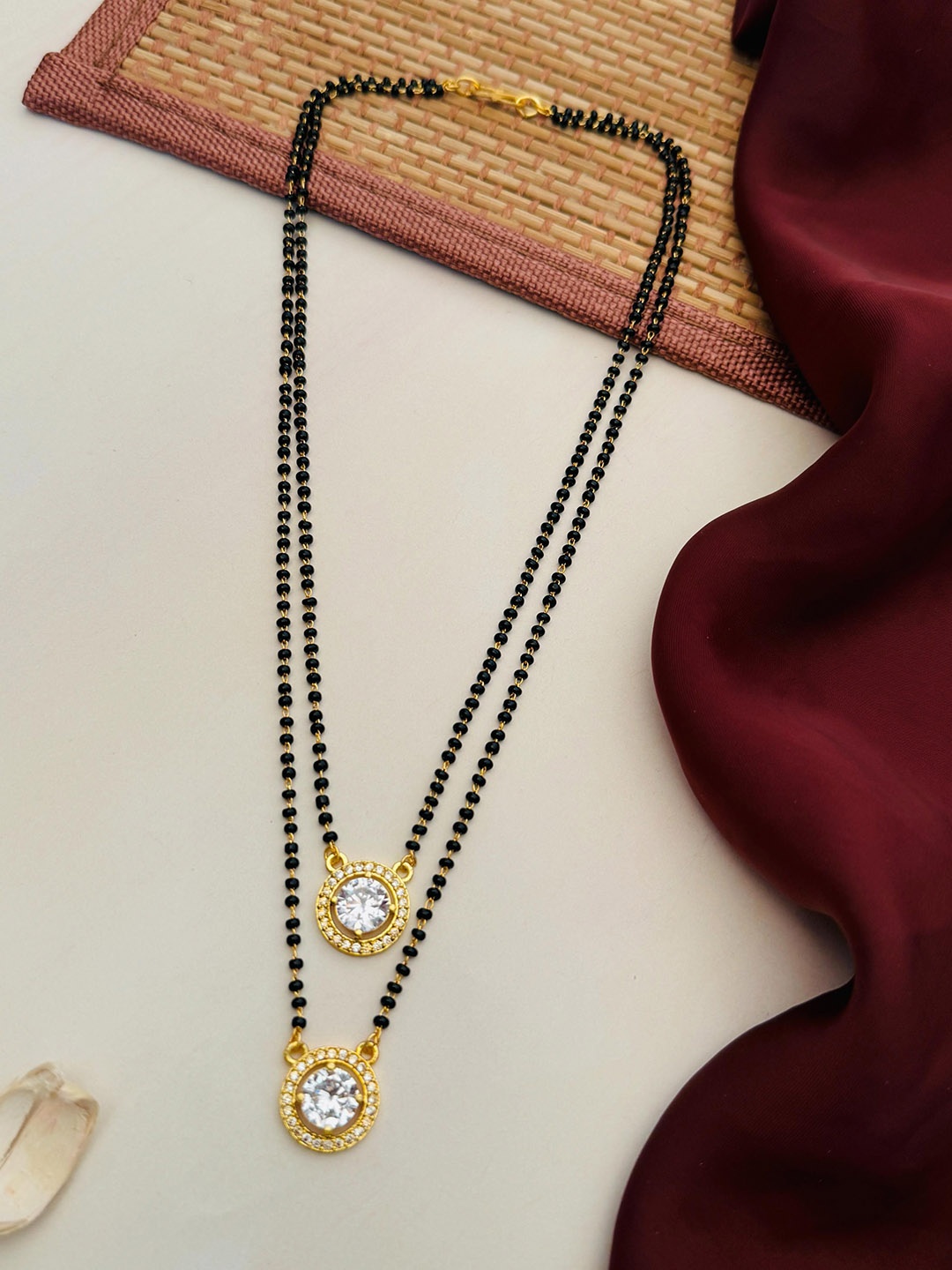 

Anouk Gold-Plated Artificial Stones and Beads Mangalsutra