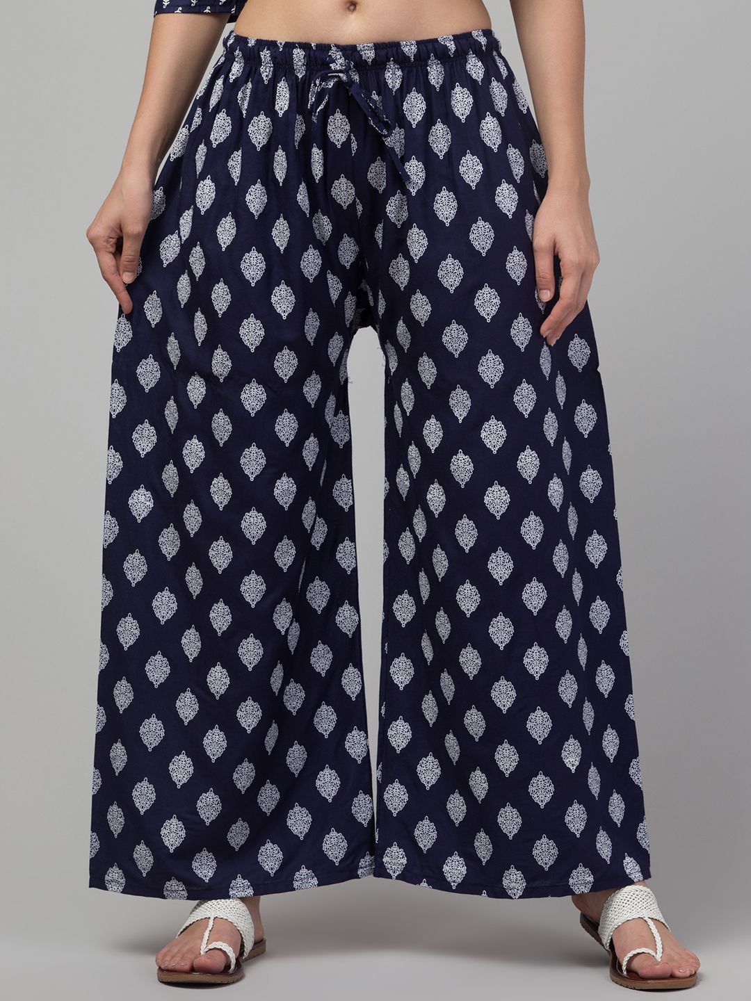 

FAMBEE Women Floral Printed Flared Knitted Palazzos, Navy blue