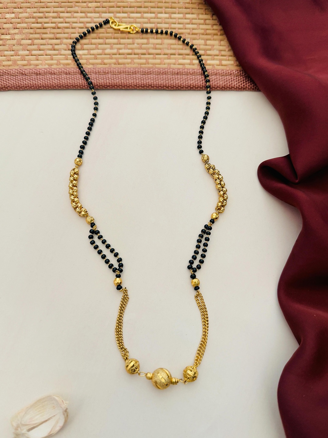 

Anouk Gold-Plated Artificial Stones and Beads Mangalsutra