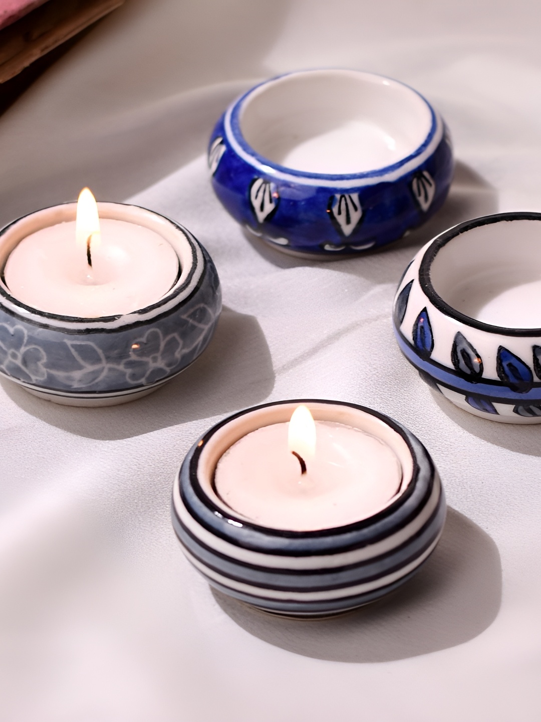 

Indianshelf Blue & White 4 Pieces Candle Holder