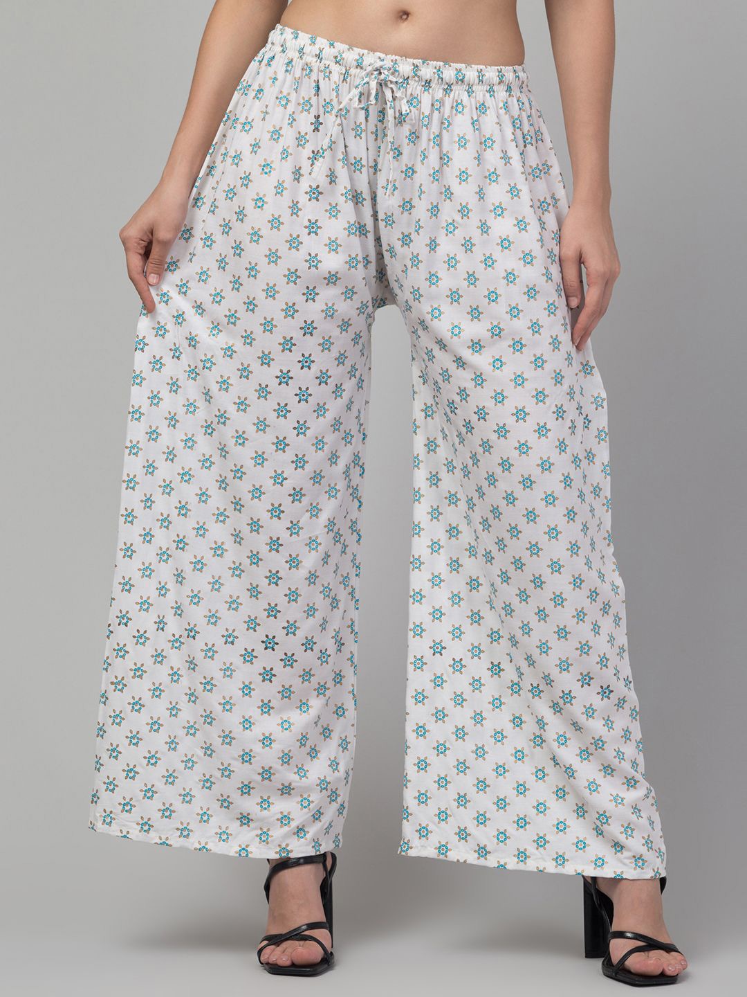 

FAMBEE Women Printed Flared Knitted Palazzos, Cream