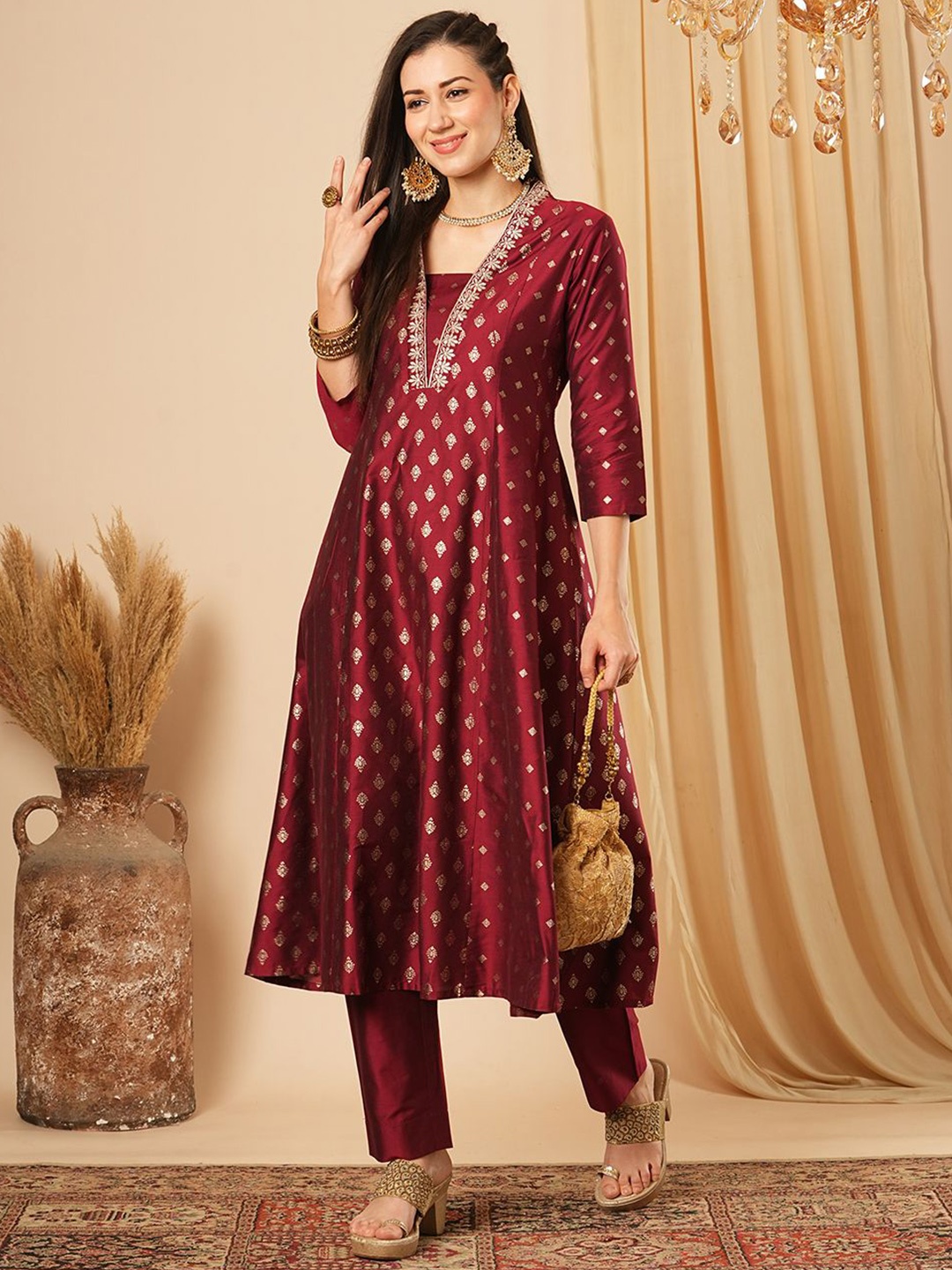 

Globus Women Ethnic Motifs Printed Panelled Thread Work Kurta with Trousers, Maroon