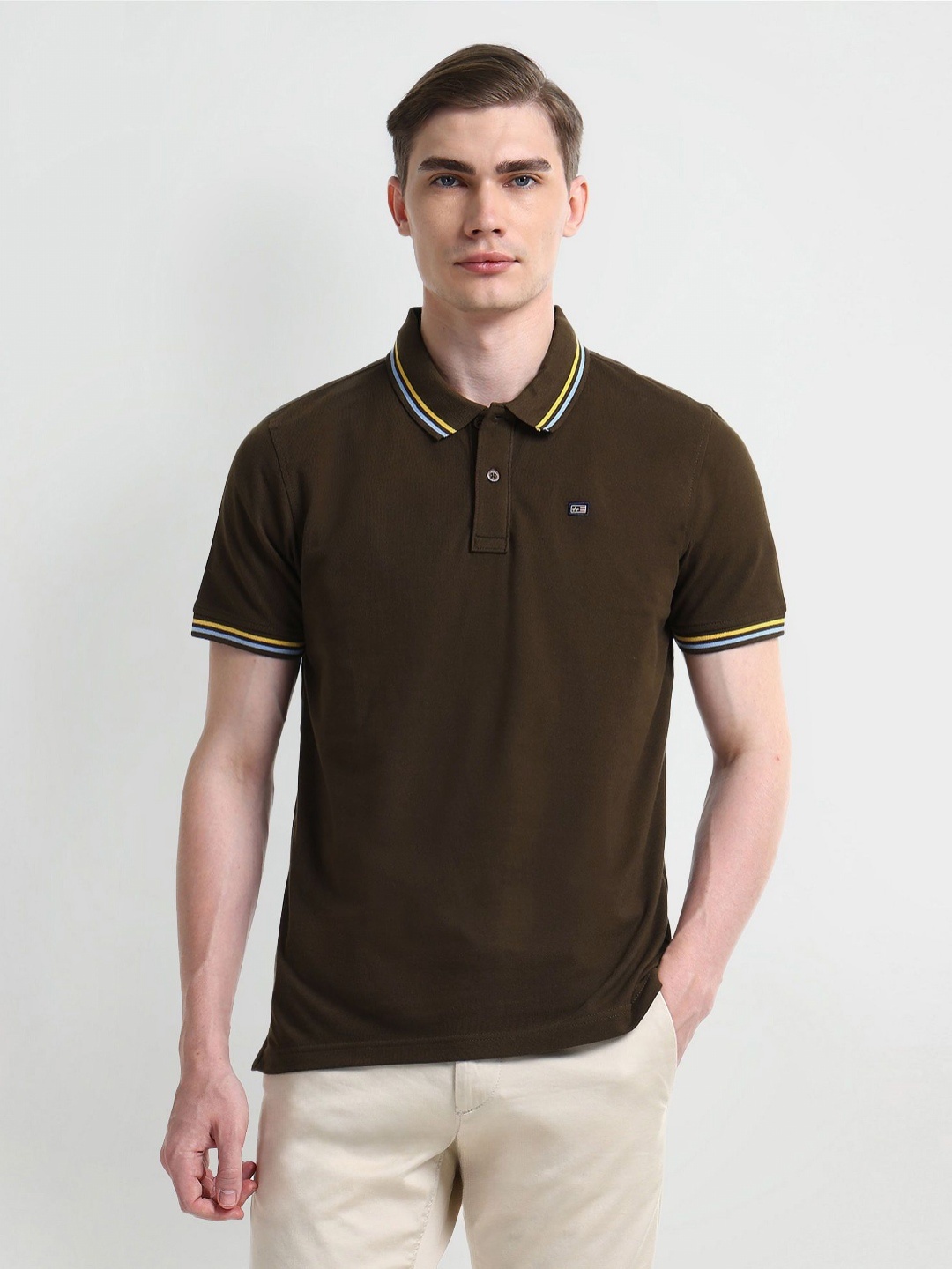 

Arrow Sport Men Solid Polo Collar Cotton T-shirt, Brown