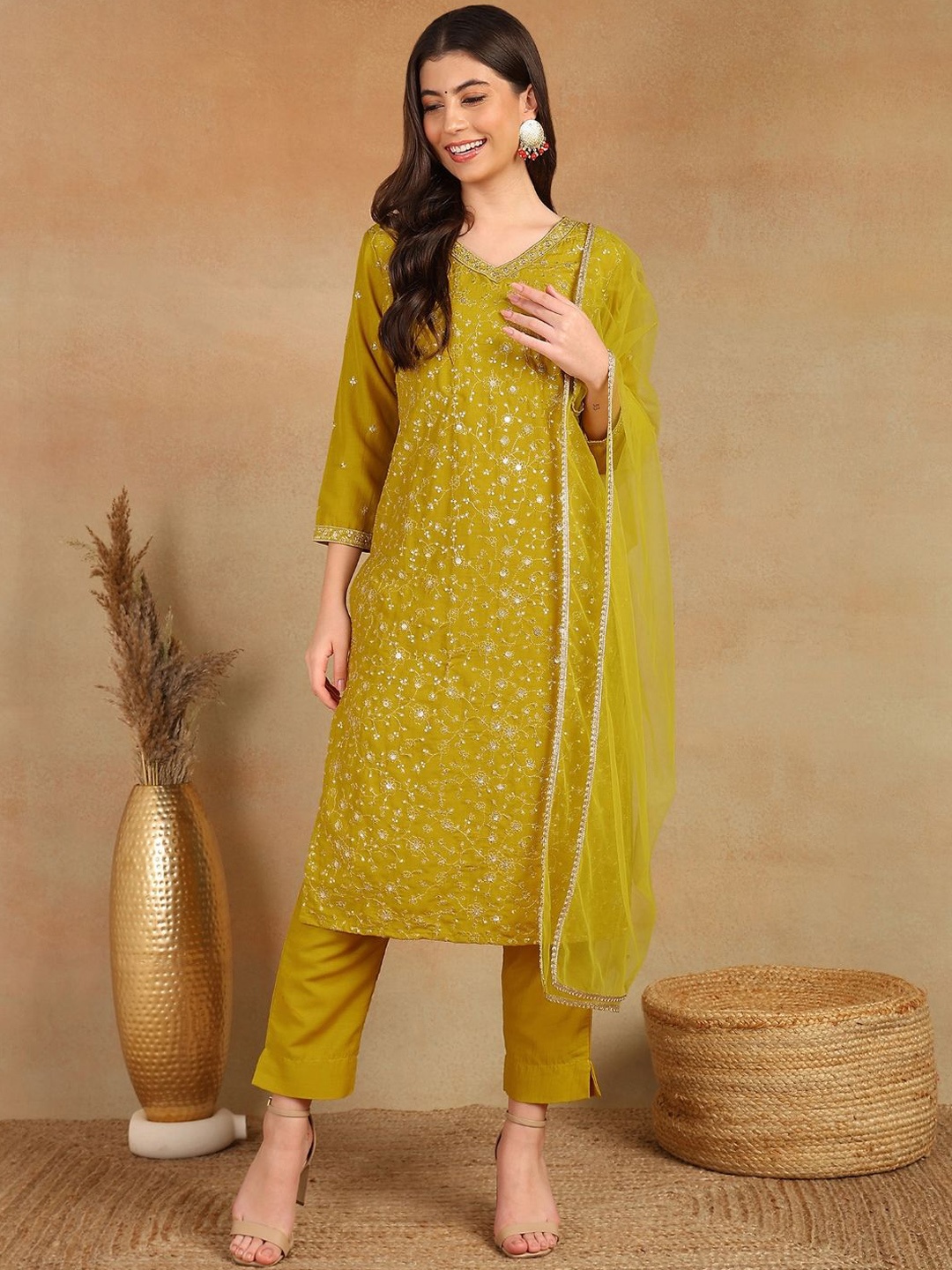 

KALINI Women Floral Embroidered Regular Sequinned Kurta with Trousers & With Dupatta, Mustard