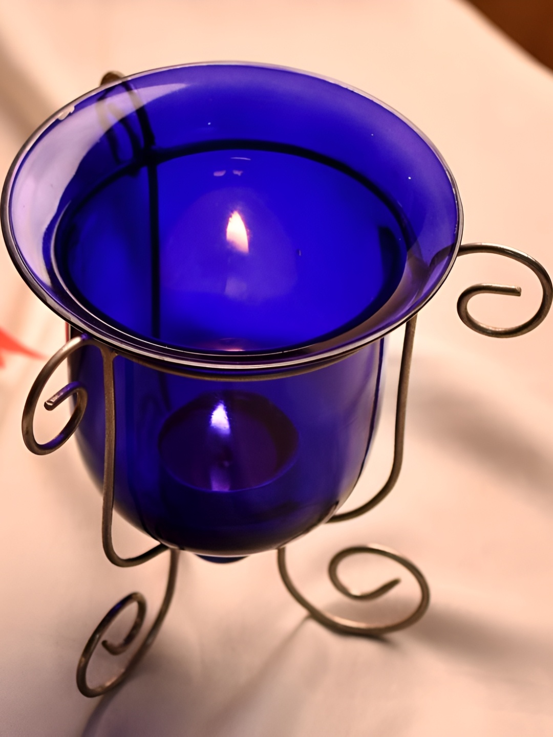 

Indianshelf Blue & Black Candle Holder