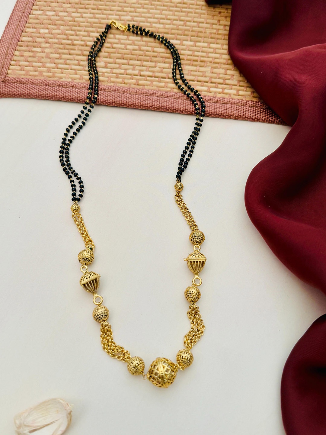 

Anouk Gold-Plated Artificial Stones and Beads Mangalsutra