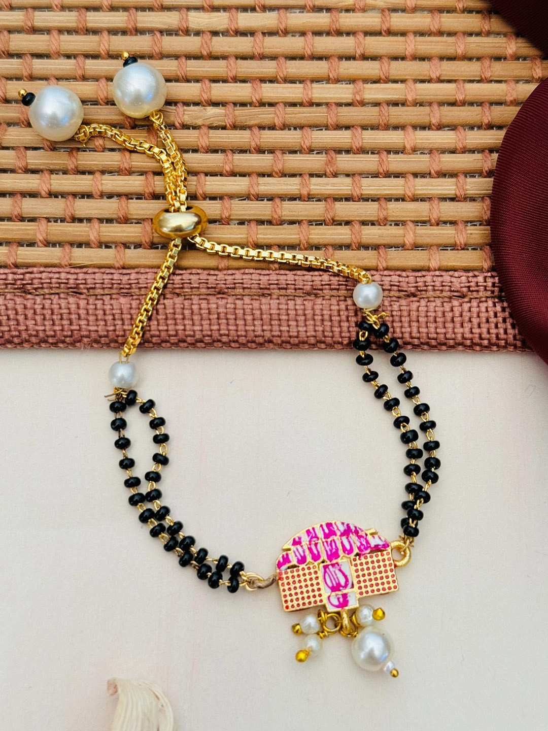 

Anouk Gold-Plated Artificial Stones and Beads Mangalsutra