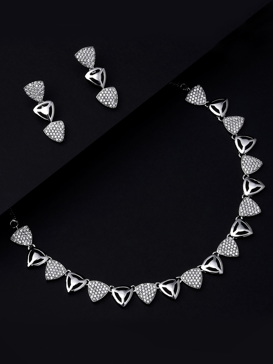

Cierra Silver Plated AD Stone Studded Oval Shape Necklace & Earrings