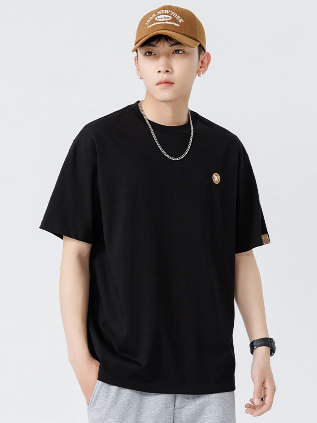 

StyleCast x Revolte Men Solid Round Neck Cotton T-shirt, Black