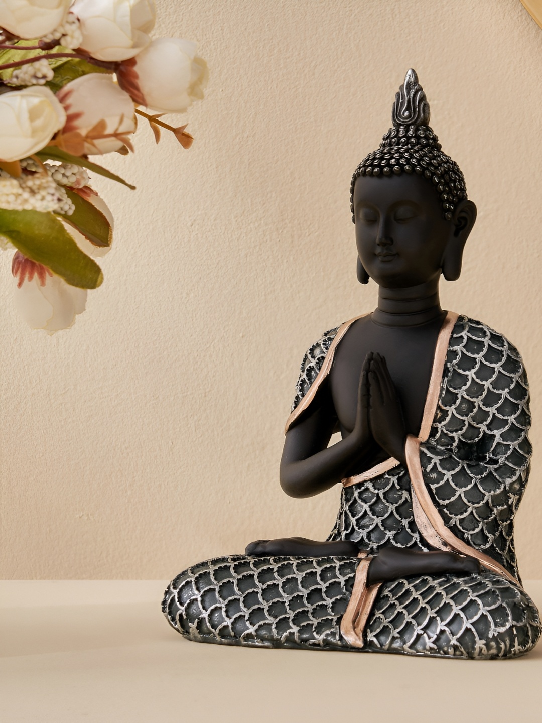 

Home Centre Black & Silver Toned Buddha Figurine Showpiece