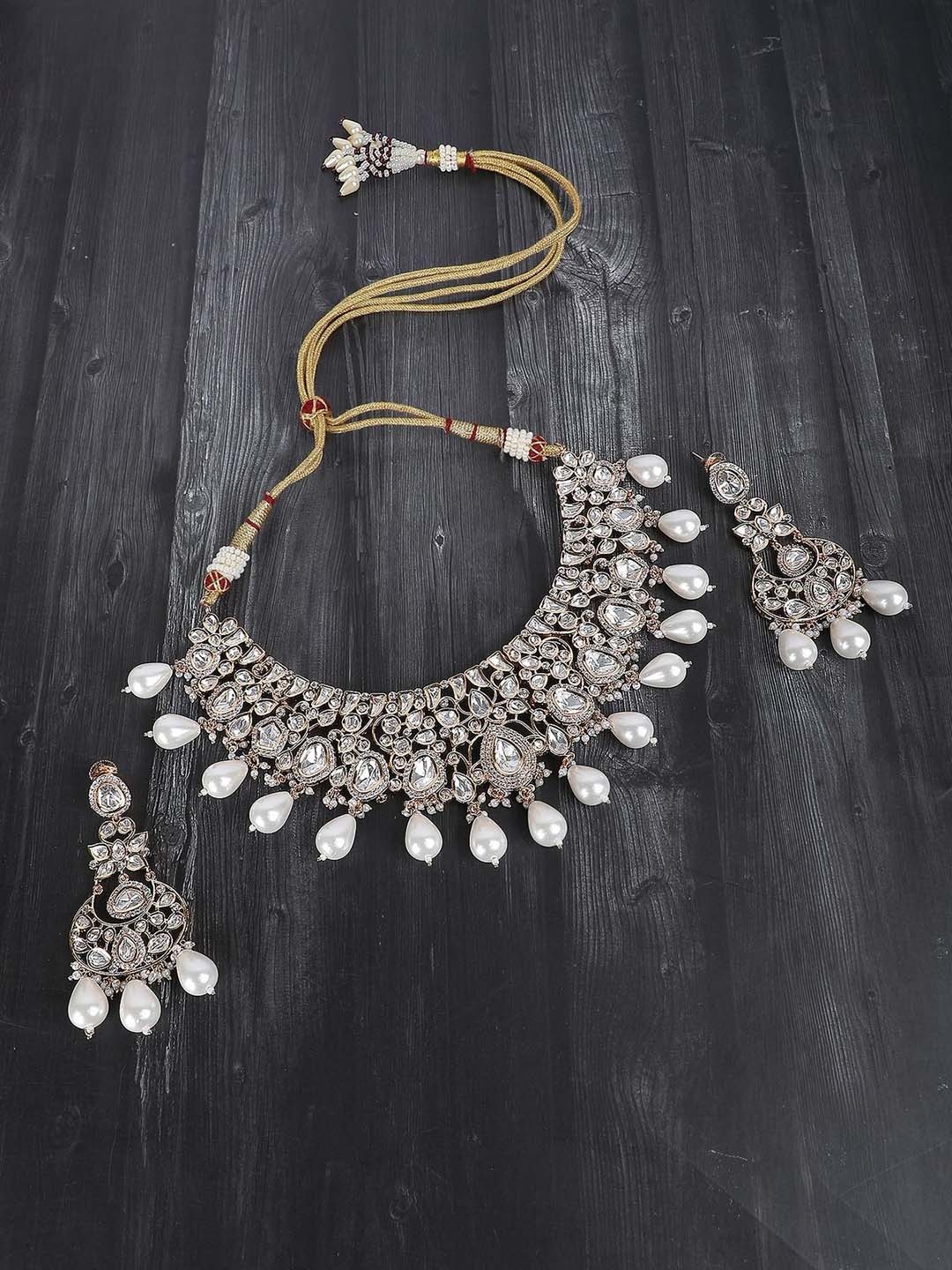 

AURAA TRENDS Gold-Plated Kundan-Studded & Pearl Beaded Jewellery Set