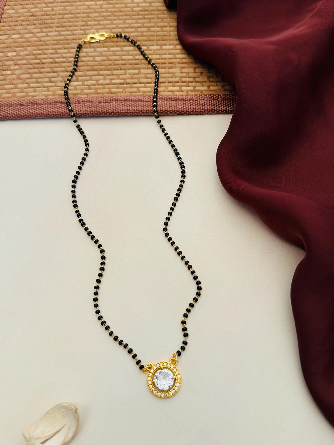 

Anouk Gold-Plated Artificial Stones and Beads Mangalsutra