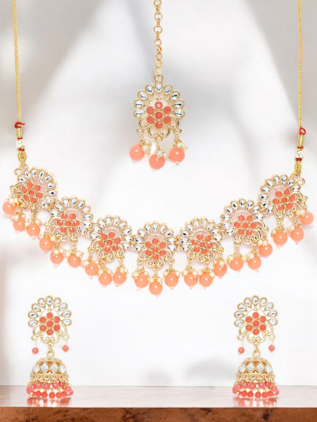 

Anouk Gold-Toned kundan Studded & Beaded Jadau Jewellery Set