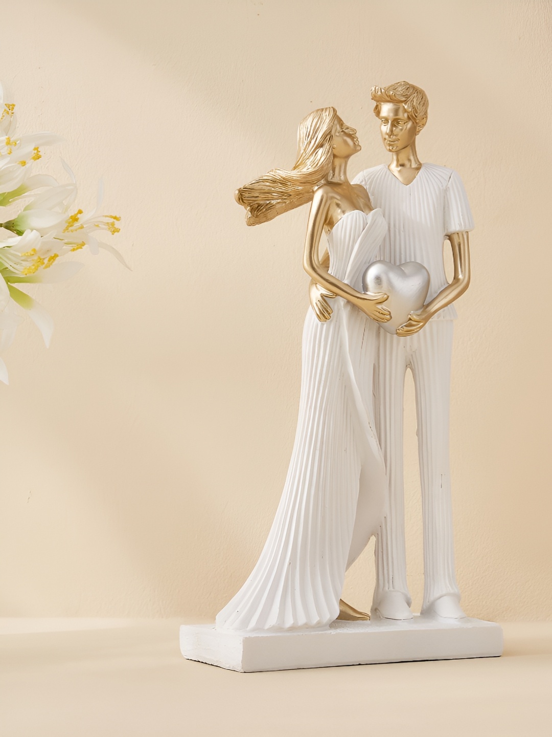 

Home Centre Corsica Polyresin White & Gold-toned Figurine Showpiece