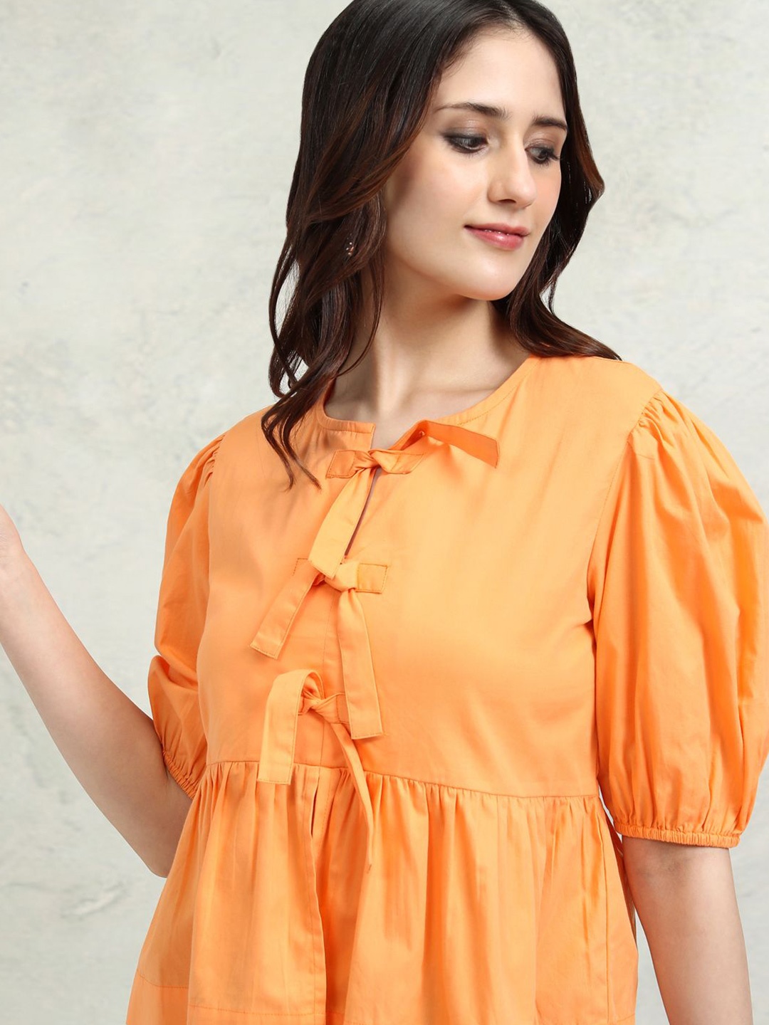 

Tokyo Talkies Women Solid Round Neck Cotton Top, Orange