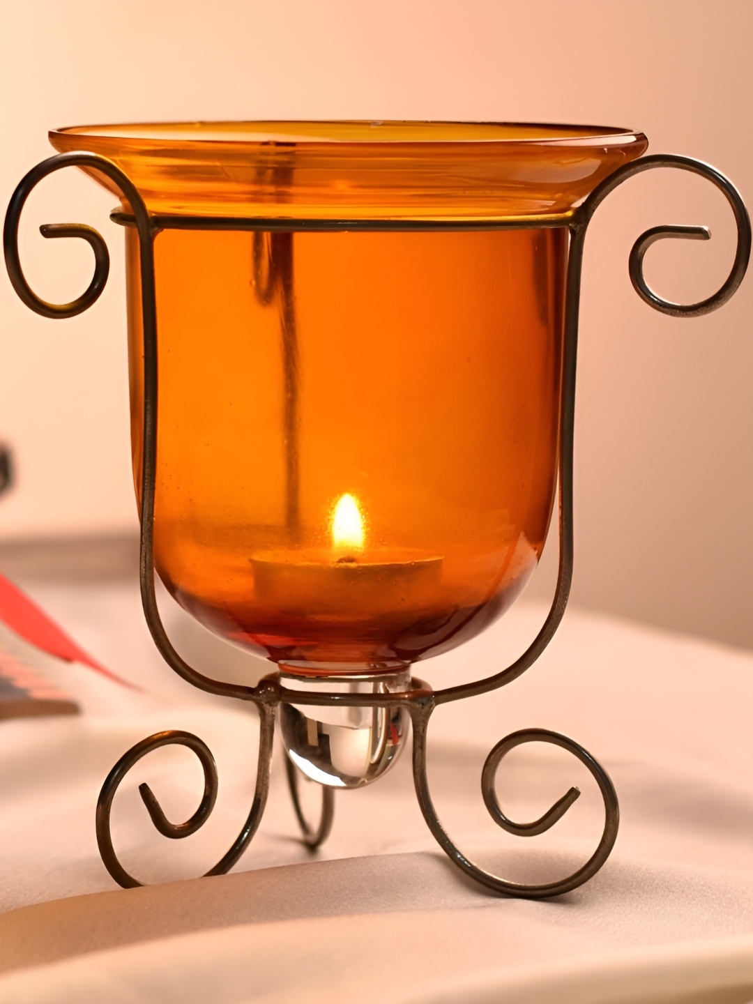 

Indianshelf Orange Colored & Black Glass Metal Candle Holder