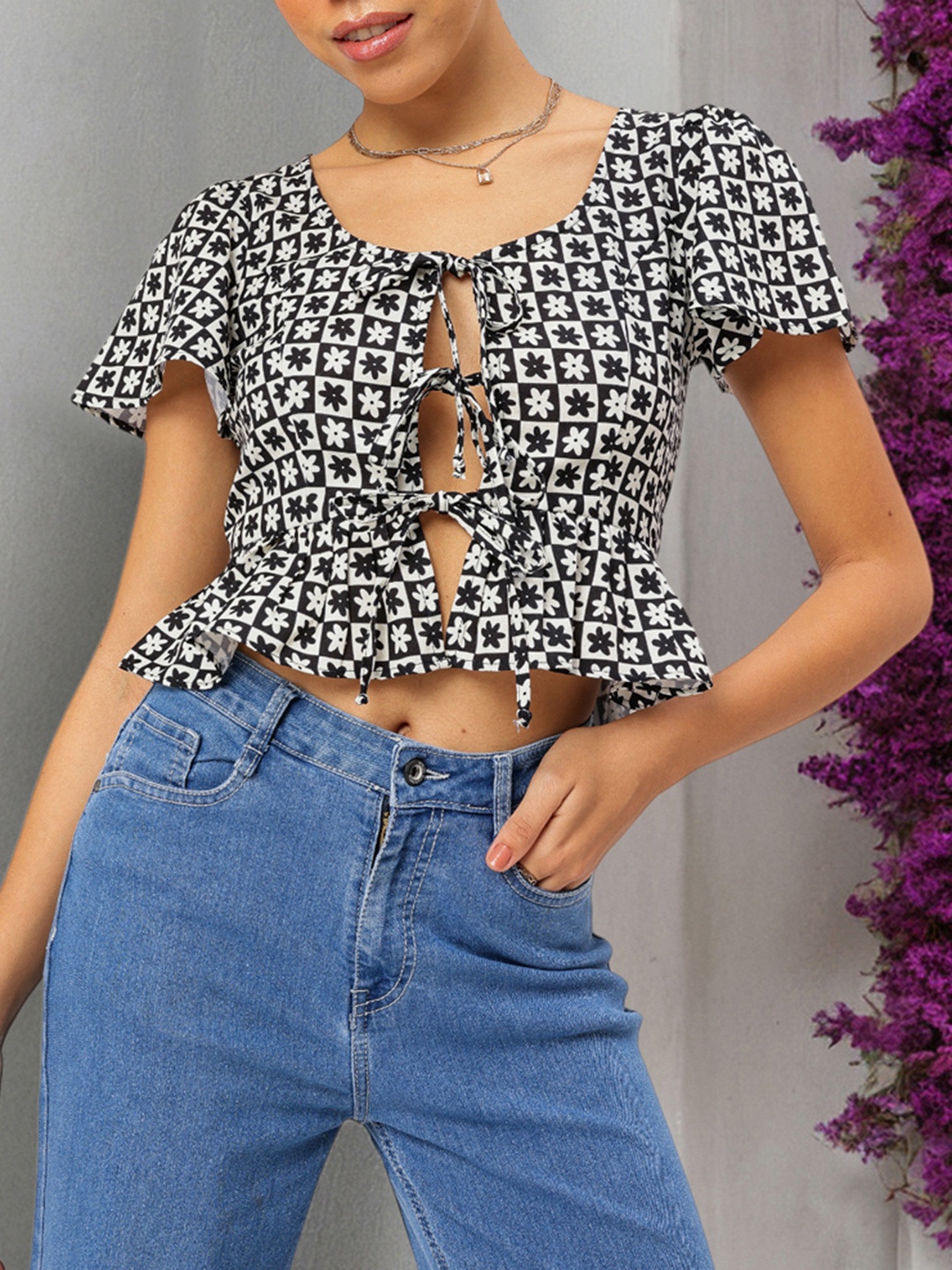 

DressBerry Checked-Out Chic Floral Monochrome Peplum Top, Black