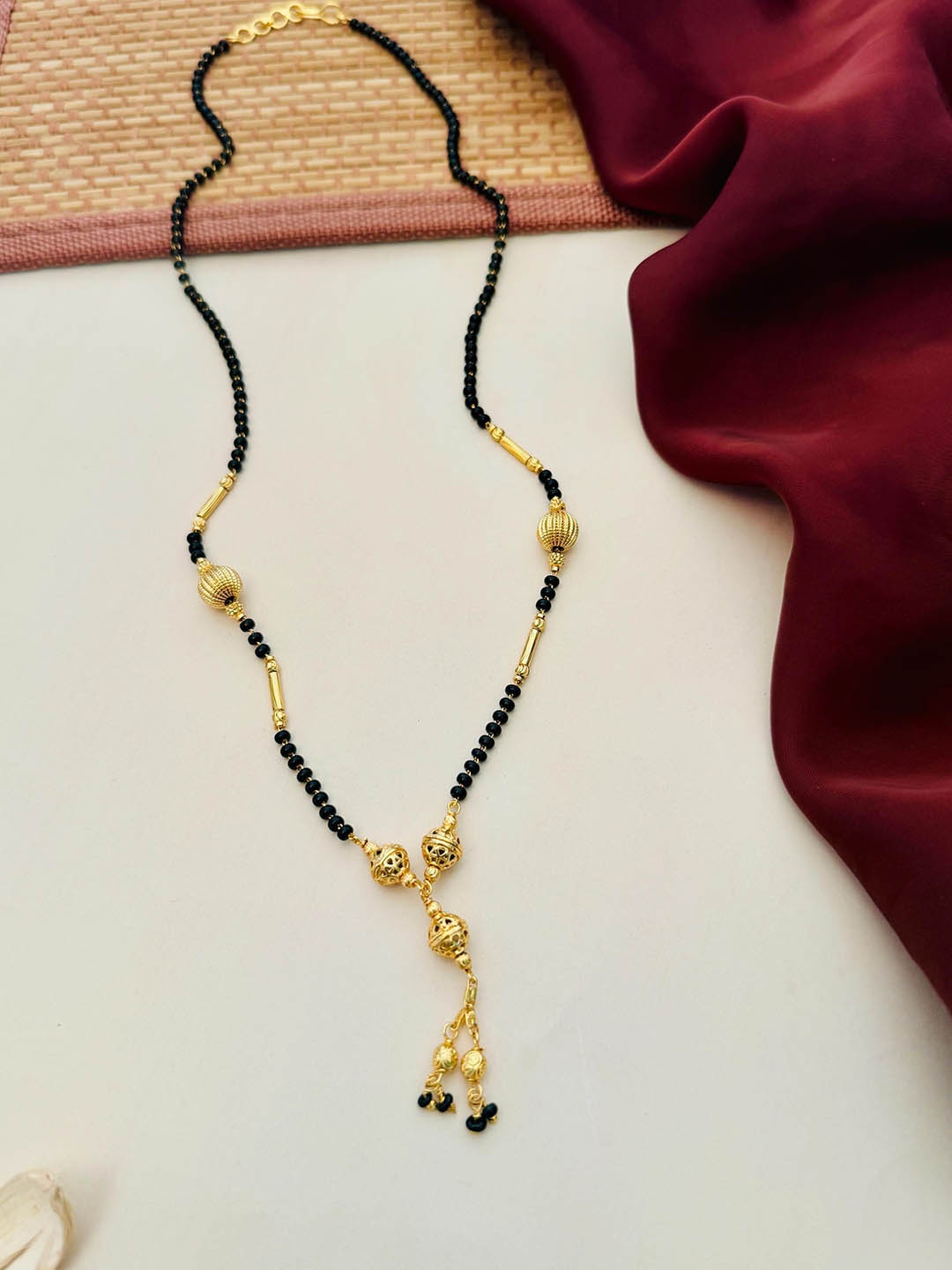 

Anouk Gold-Plated Artificial Stones and Beads Mangalsutra