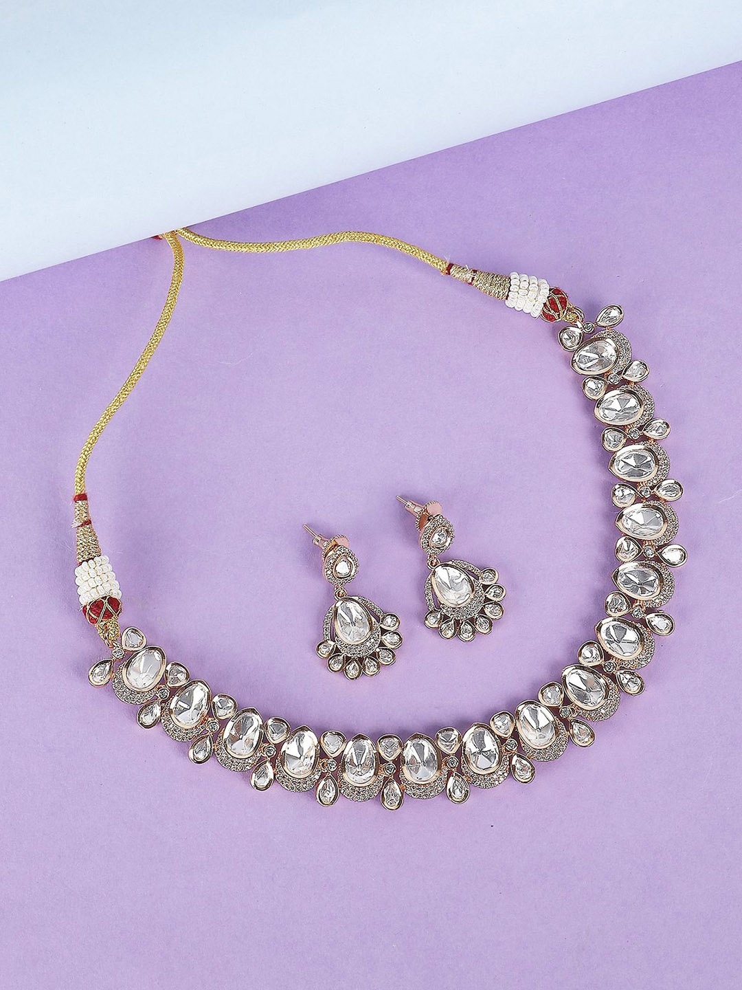 

AURAA TRENDS Gold- Plated Stones-Studded Jewellery Set