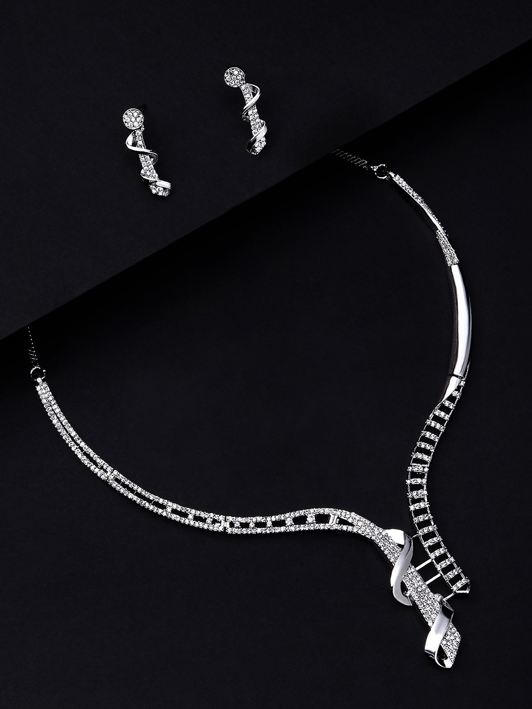 

Cierra Exotic Silver Plated AD-Studded Necklace & Earrings