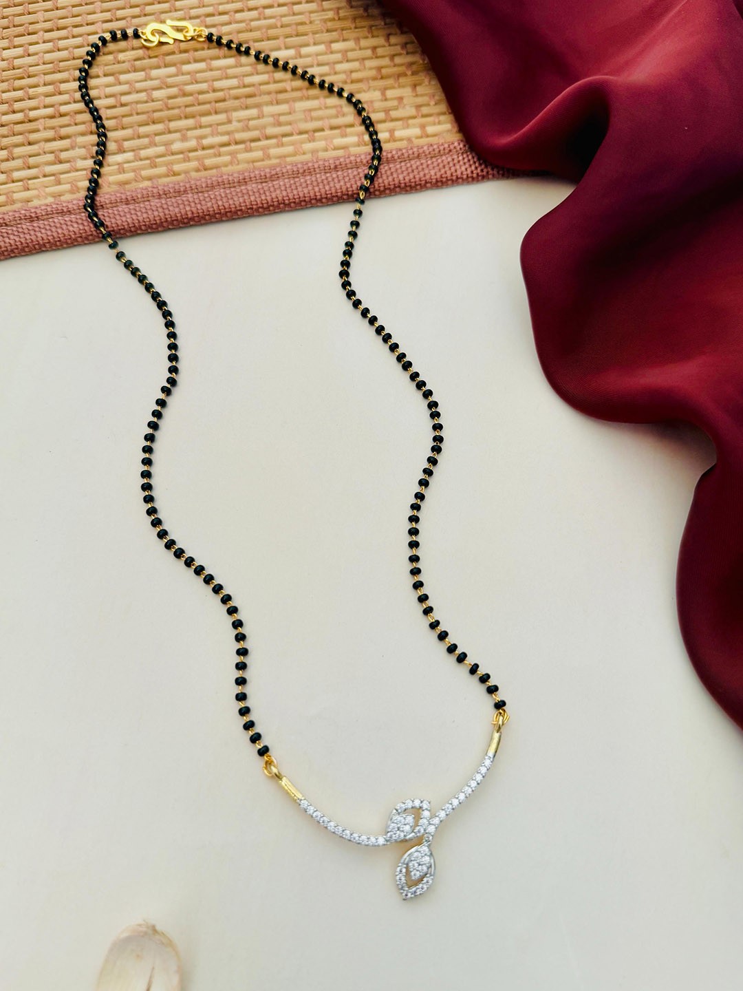 

Anouk Gold-Plated Artificial Stones and Beads Mangalsutra