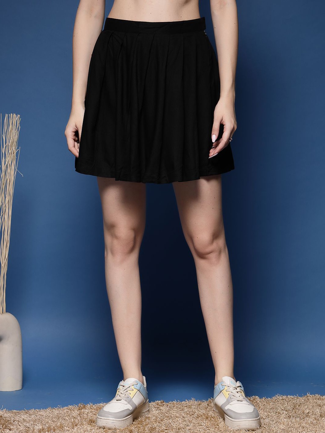 

DAEVISH Women Solid Flared Above Knee Skirts, Black
