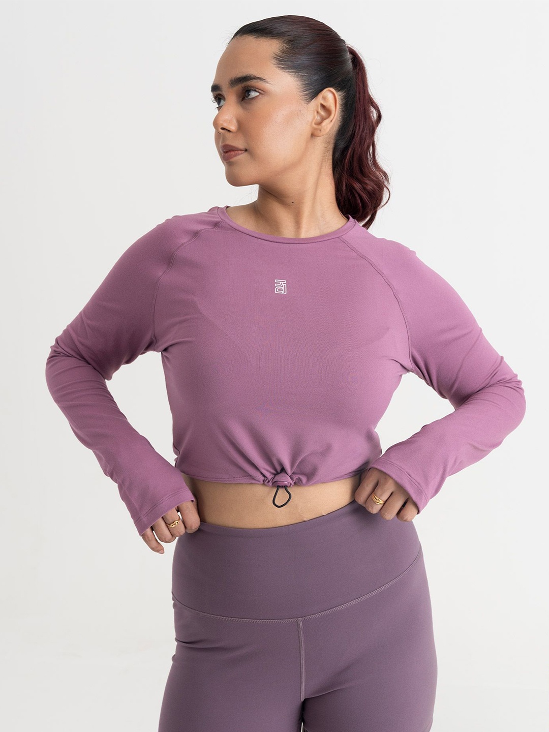 

Hunnit Zen Full Sleeve Solid Round Neck Crop Top, Peach