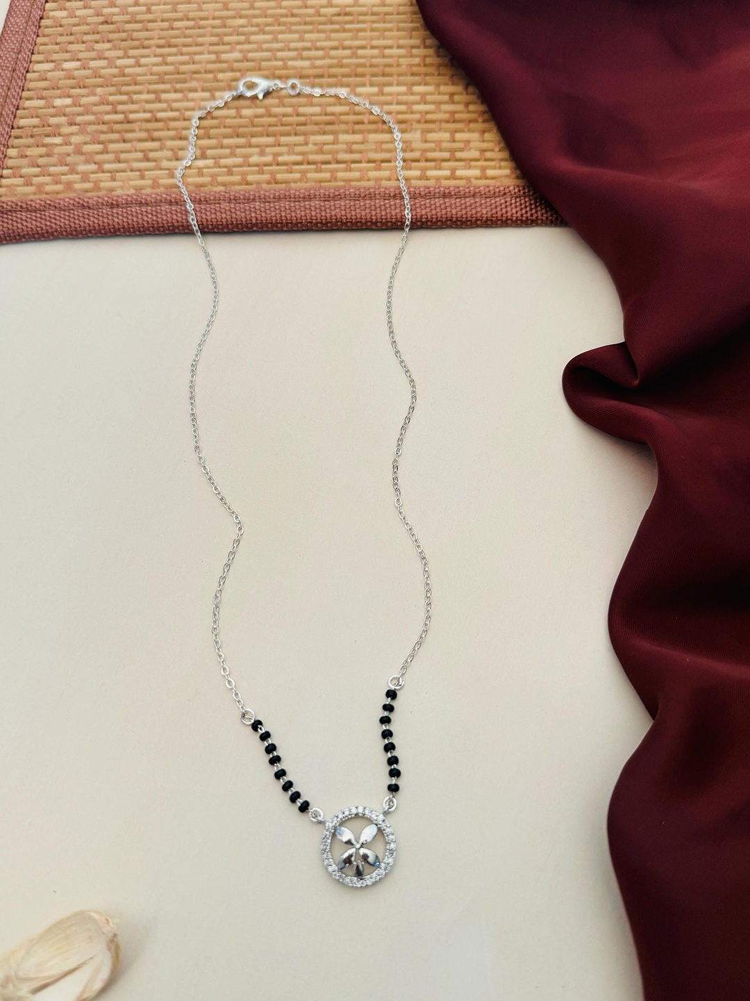 

Anouk Silver-Plated Artificial Stones and Beads Mangalsutra