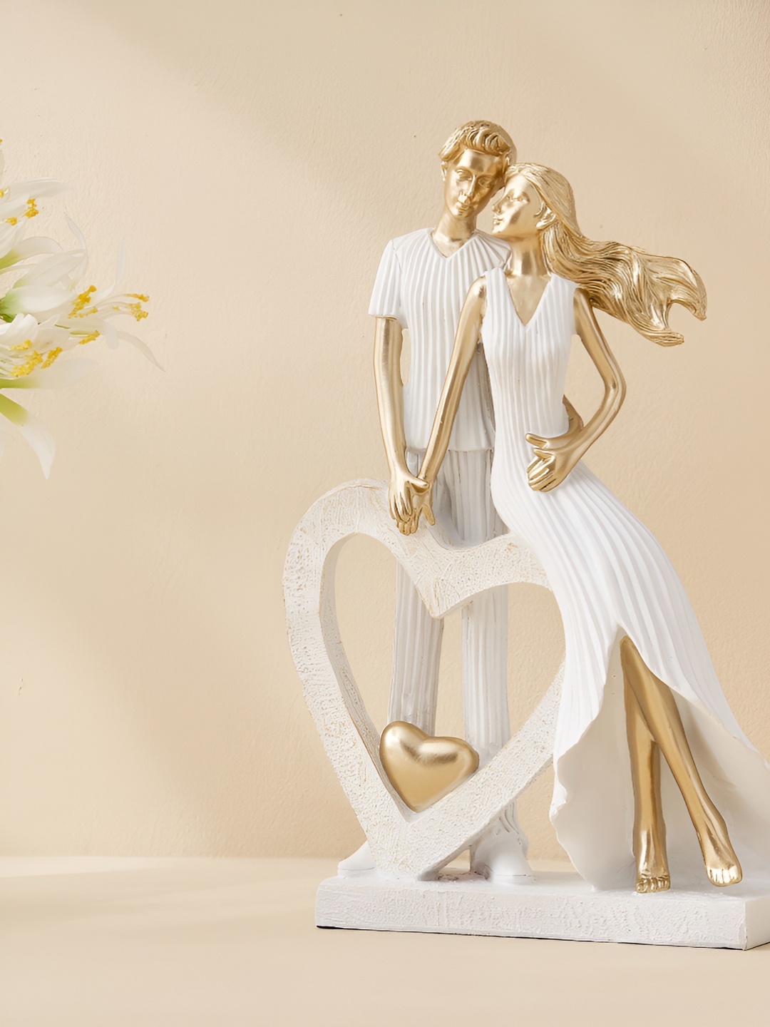 

Home Centre Corsica White & Gold-Toned Figurine Showpiece