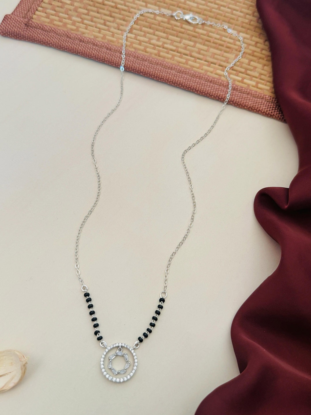 

Anouk Silver-Plated Artificial Stones and Beads Mangalsutra