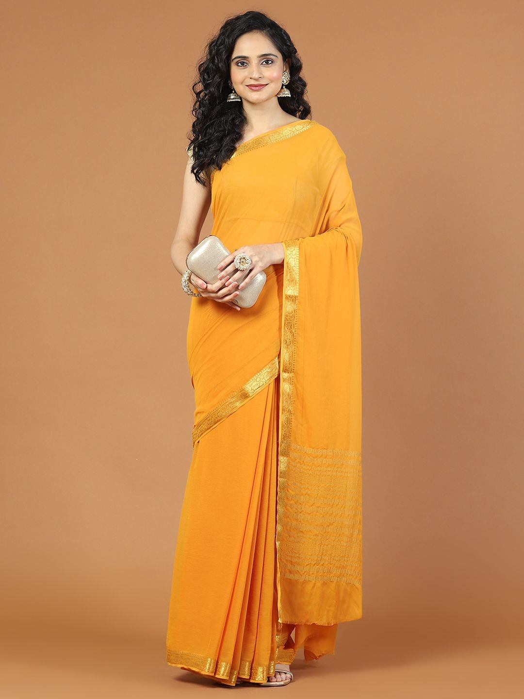 

Meena Bazaar Solid Zari Saree With Woven Design Border, Yellow