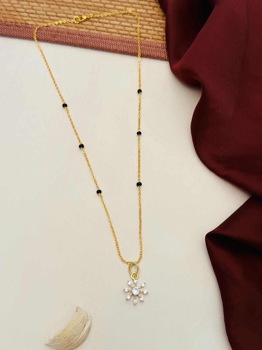 

Anouk Gold-Plated Artificial Stones and Beads Mangalsutra