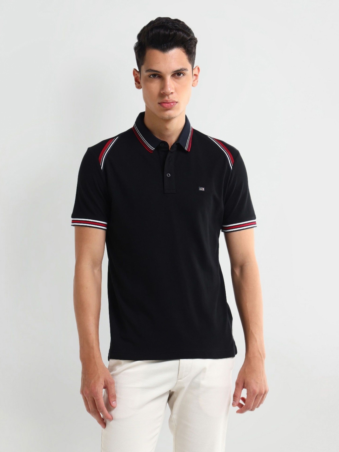 

Arrow Men Solid Polo Collar Cotton T-shirt, Black