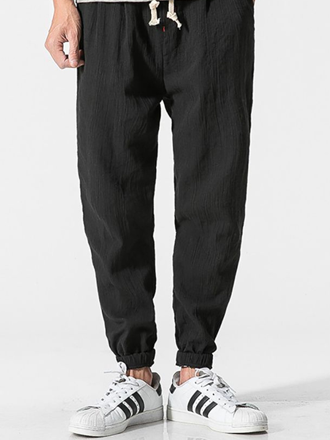 

StyleCast x Revolte Men Solid Loose Fit Chinos Trousers, Black