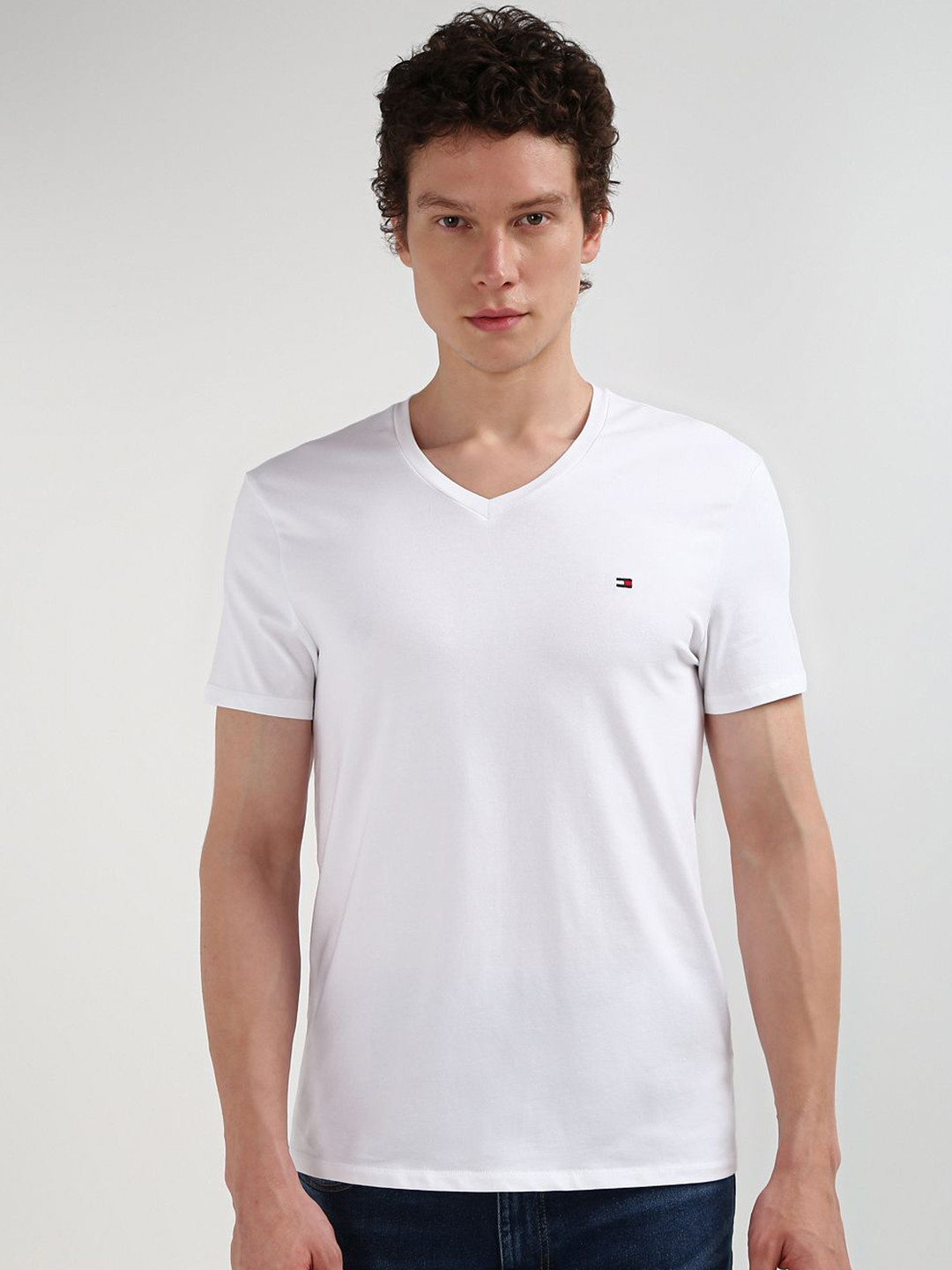 

Tommy Hilfiger Men Solid Pure Cotton V-Neck Slim Fit T-shirt, White