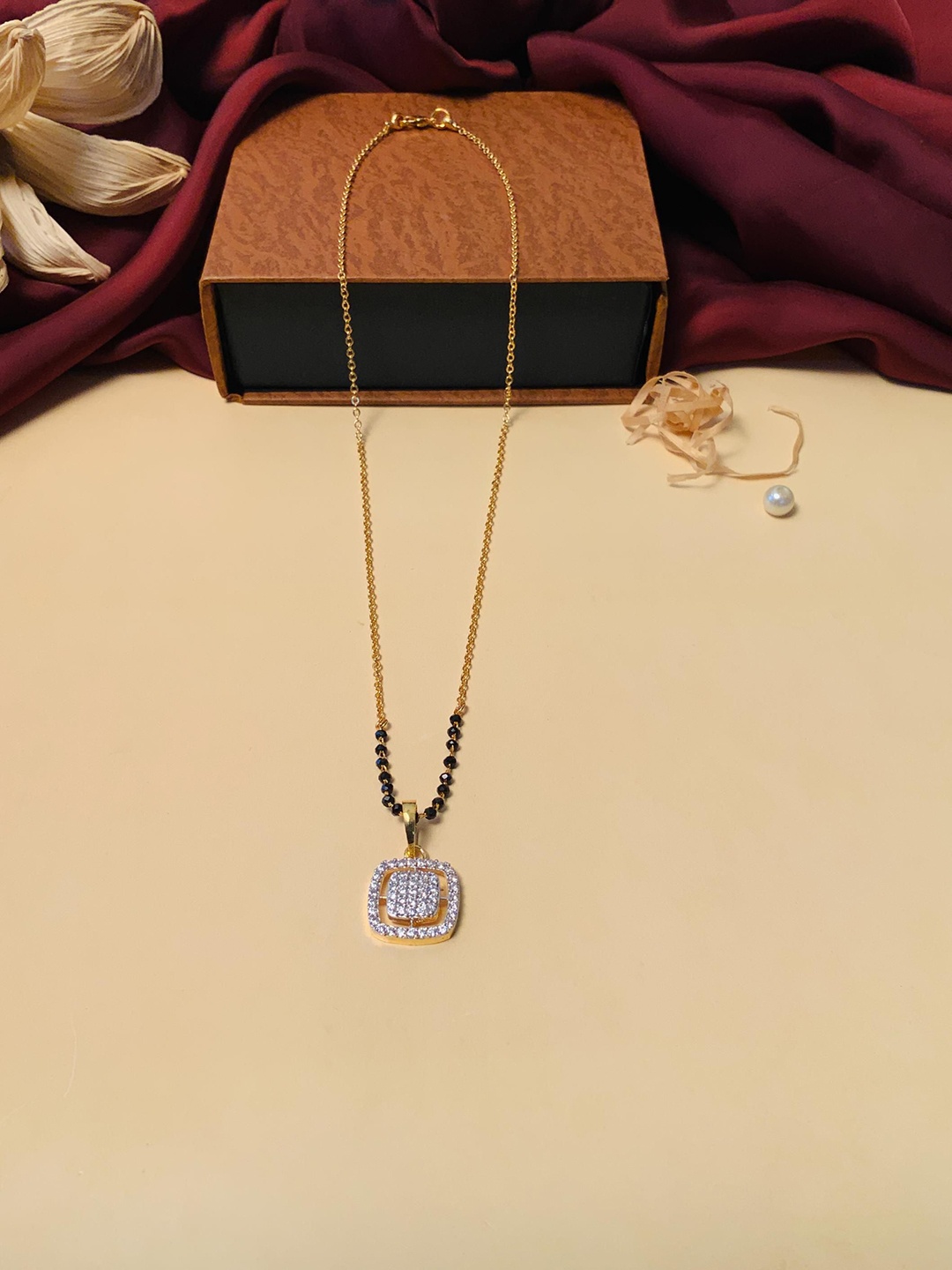 

Anouk Gold-Plated Artificial Stones and Beads Mangalsutra