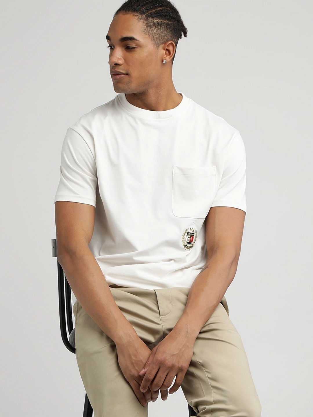 

Tommy Hilfiger Men Solid Round Neck Cotton T-shirt, White