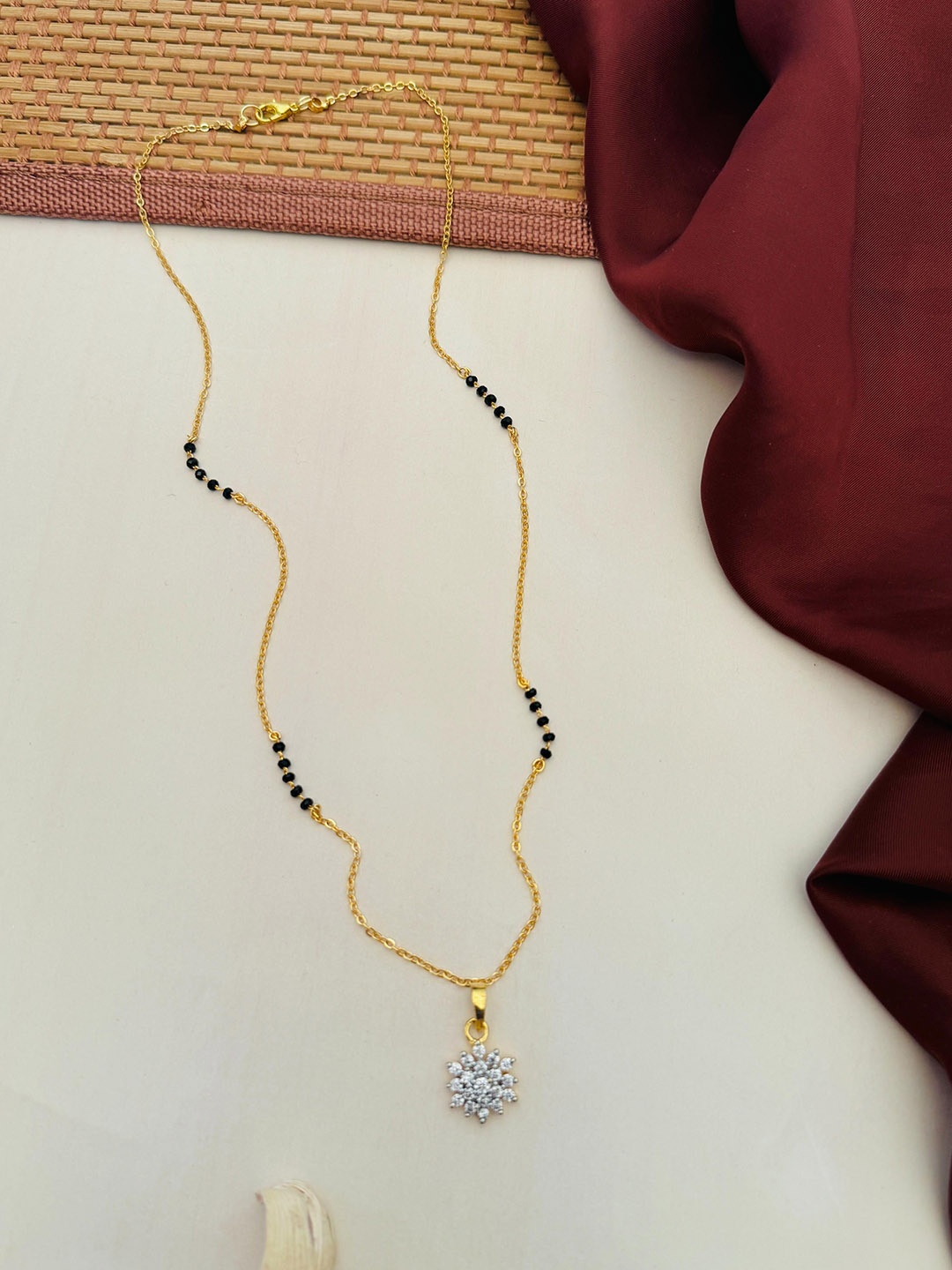 

Anouk Gold-Plated Artificial Stones and Beads Mangalsutra