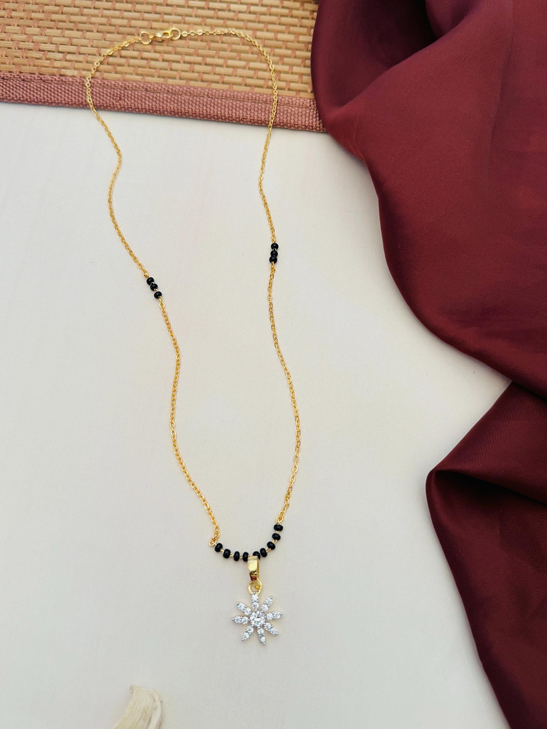 

Anouk Gold-Plated Artificial Stones and Beads Mangalsutra