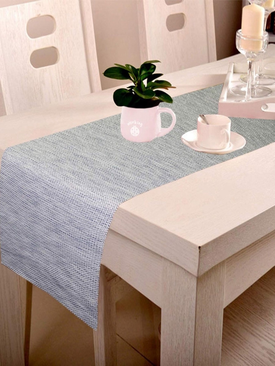 

Lushomes Grey Checked Rectangular Waterproof and Heat 6 Seater Table Runner, Gold