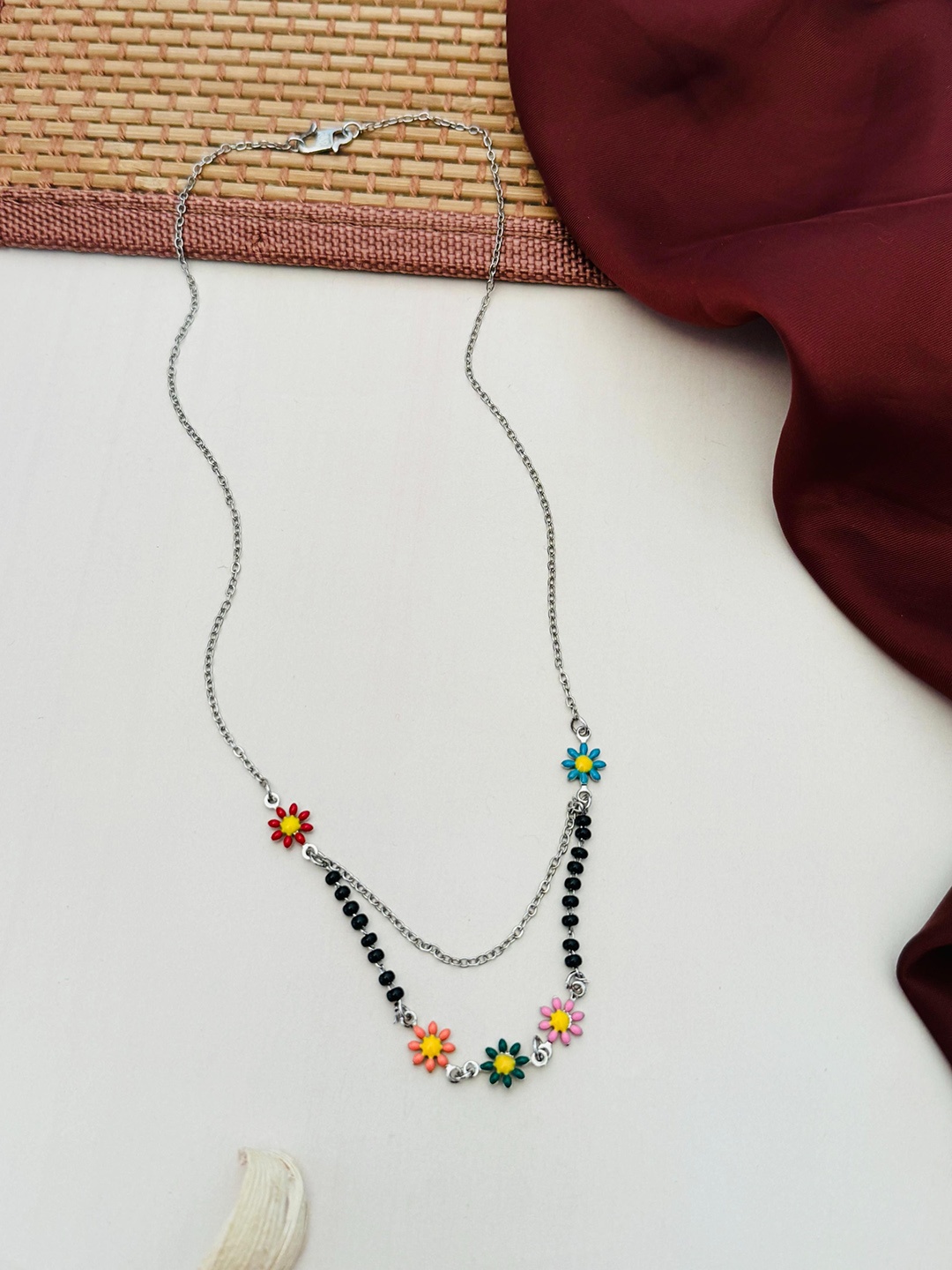 

Anouk Silver-Plated Artificial Stones and Beads Mangalsutra