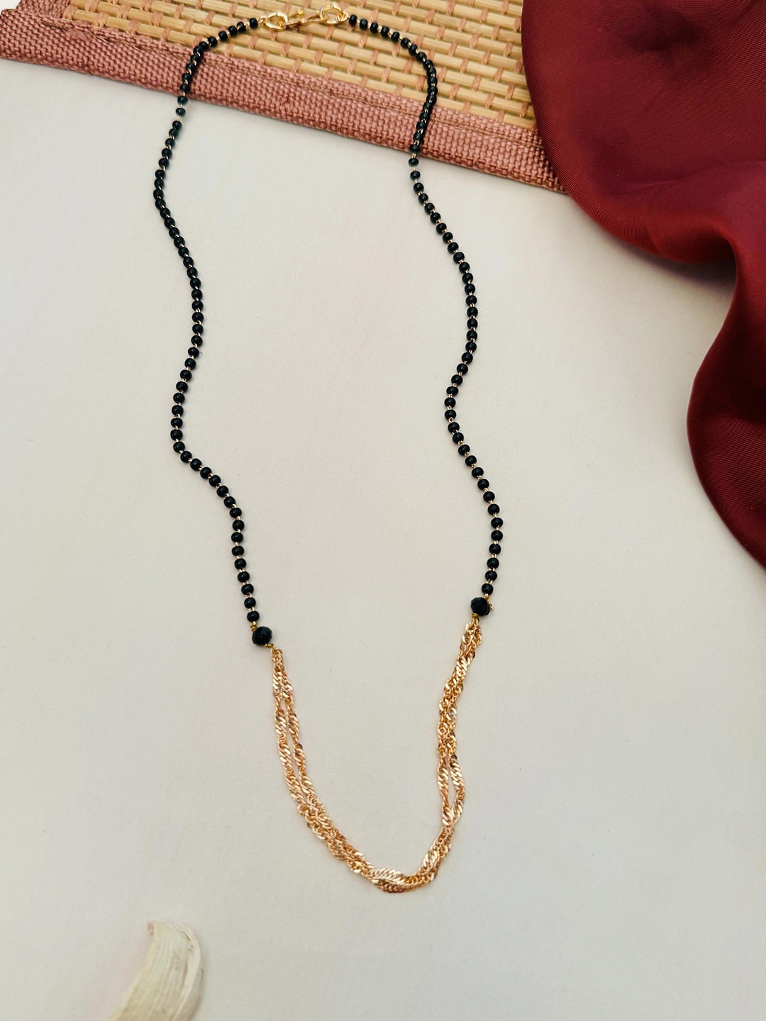 

Anouk Rose Gold-Plated Artificial Stones and Beads Mangalsutra