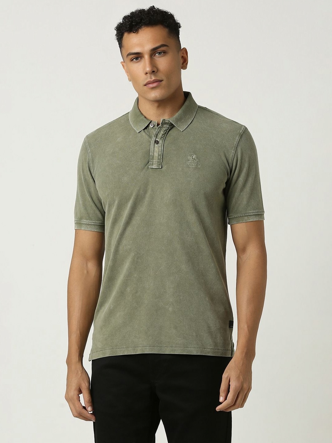 

Peter England Casuals Men Self Design Polo Collar Cotton T-shirt, Olive