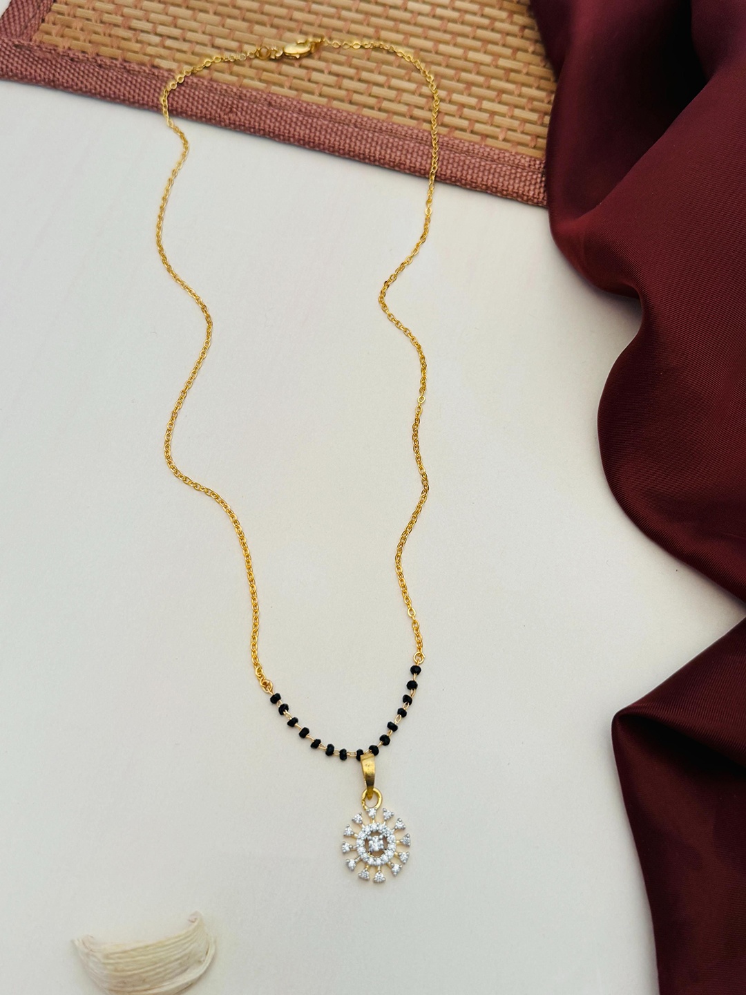 

Anouk Gold-Plated Artificial Stones and Beads Mangalsutra