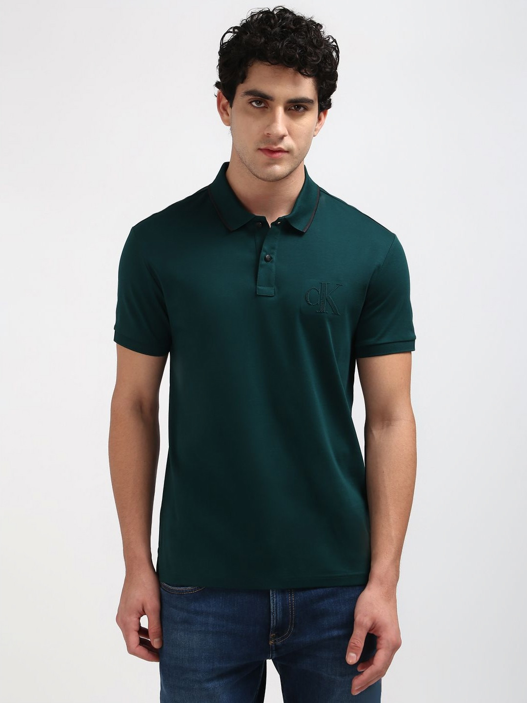 

Calvin Klein Jeans Men Solid Round Neck Cotton T-shirt, Green