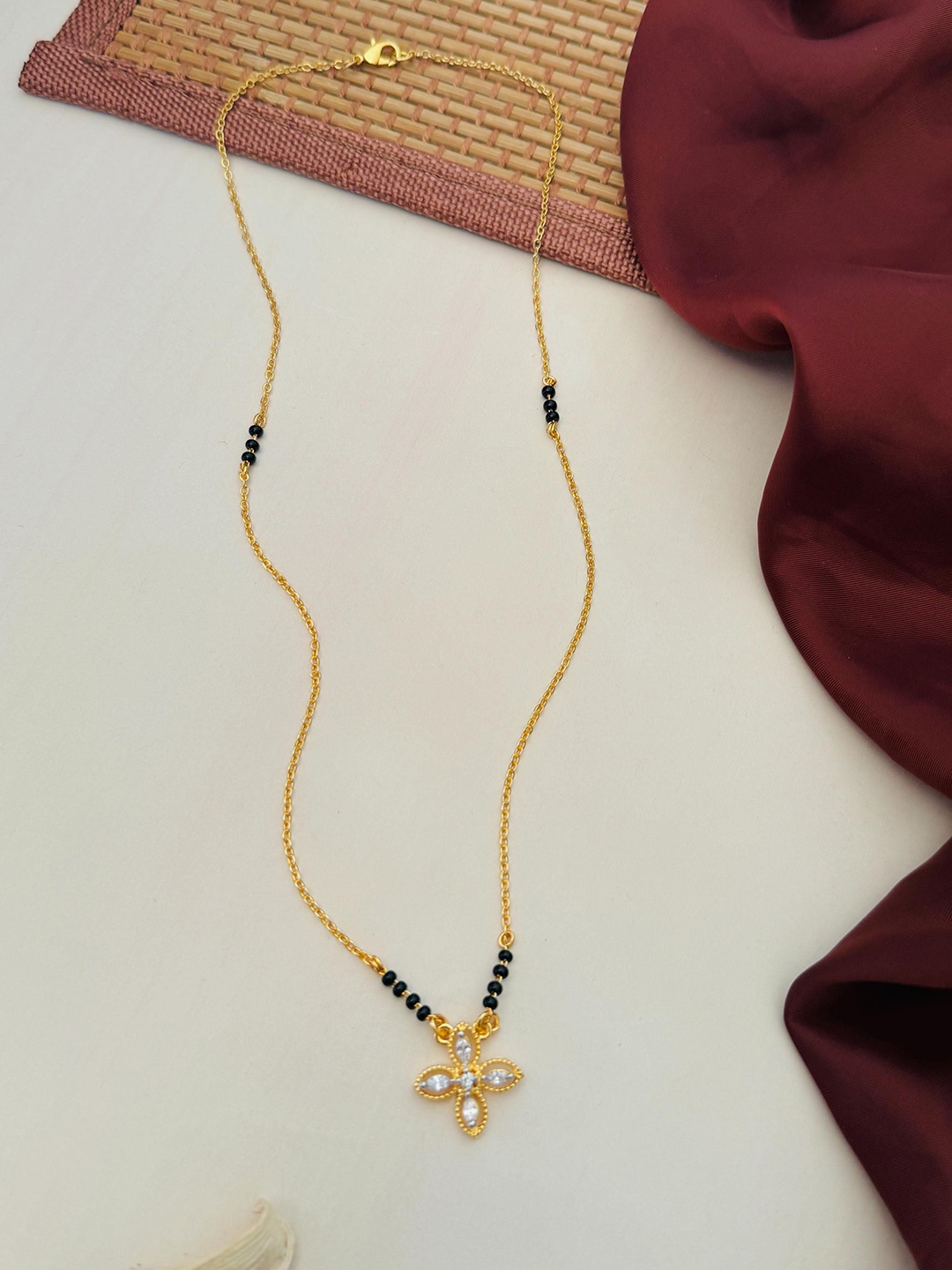 

Anouk Gold-Plated Artificial Stones and Beads Mangalsutra