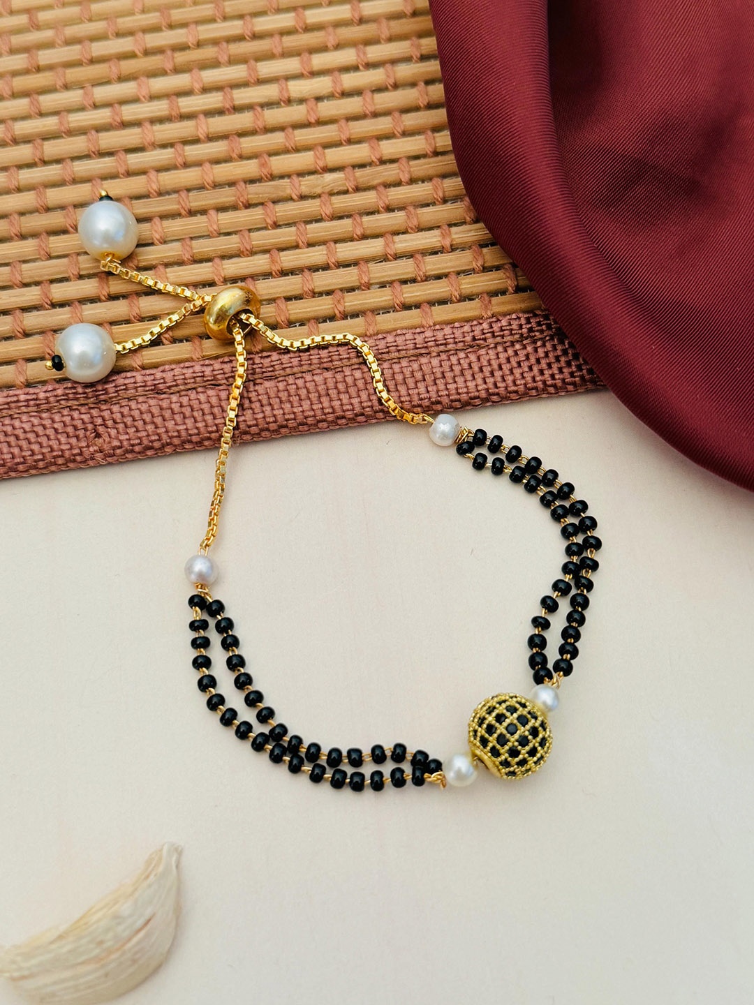 

Anouk Gold-Plated Artificial Stones and Beads Mangalsutra