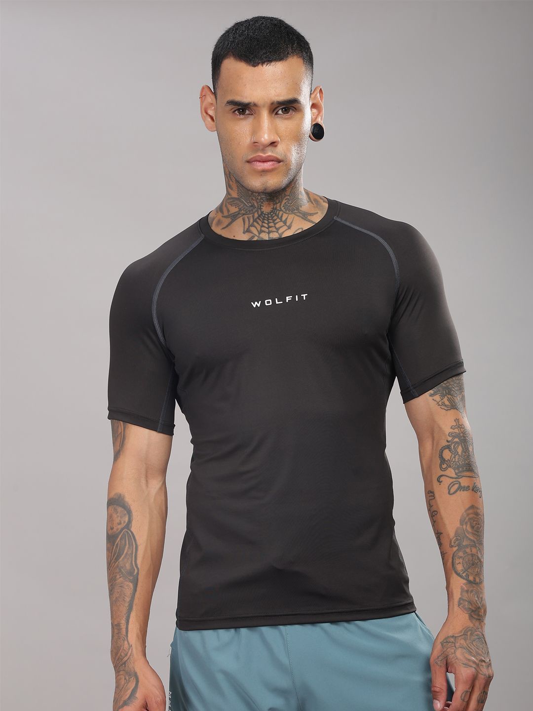 

WOLFIT ATHLEISURE Men Dri-FIT Solid Round Neck Compression T-shirt, Black